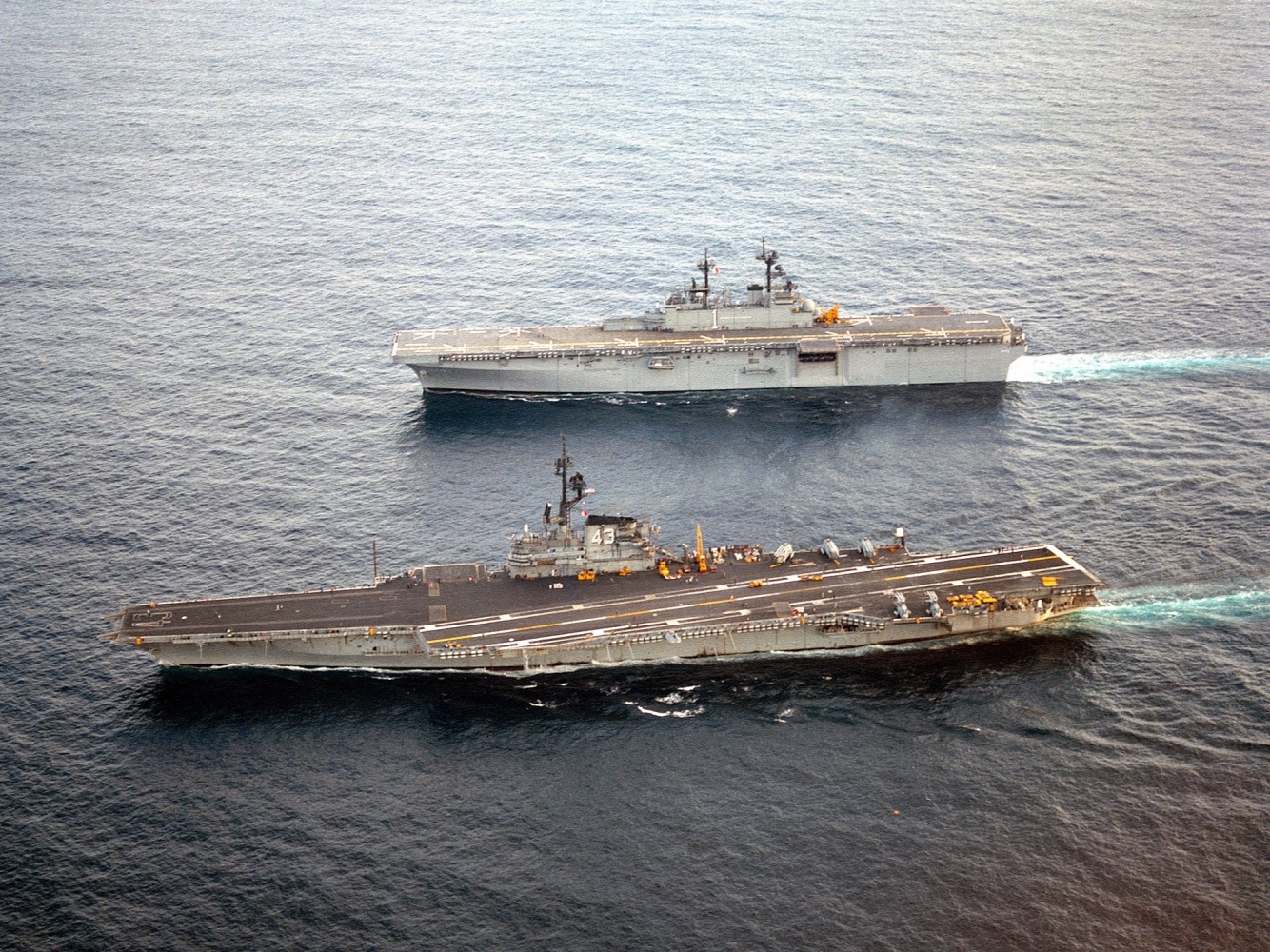 1920px-USS_Coral_Sea_(CV-43)_and_Wasp_(LHD-1)_underway_in_1989.JPEG
